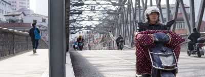 Shanghai bridge, street photography, Winter in Shanghai, Chinese man on a motorbike with winter outfit.